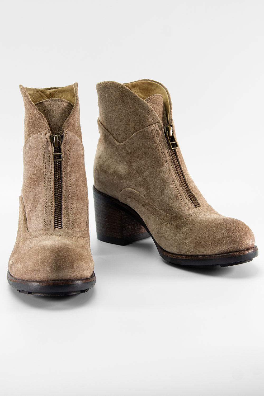 RILEY light-sand suede boots.