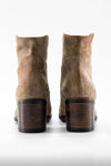 RILEY light-sand suede boots.