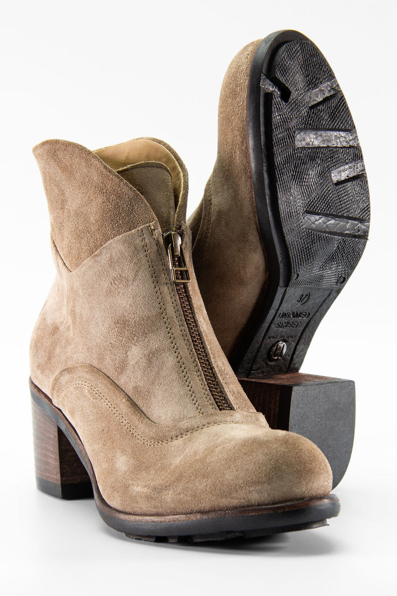 RILEY light-sand suede boots.