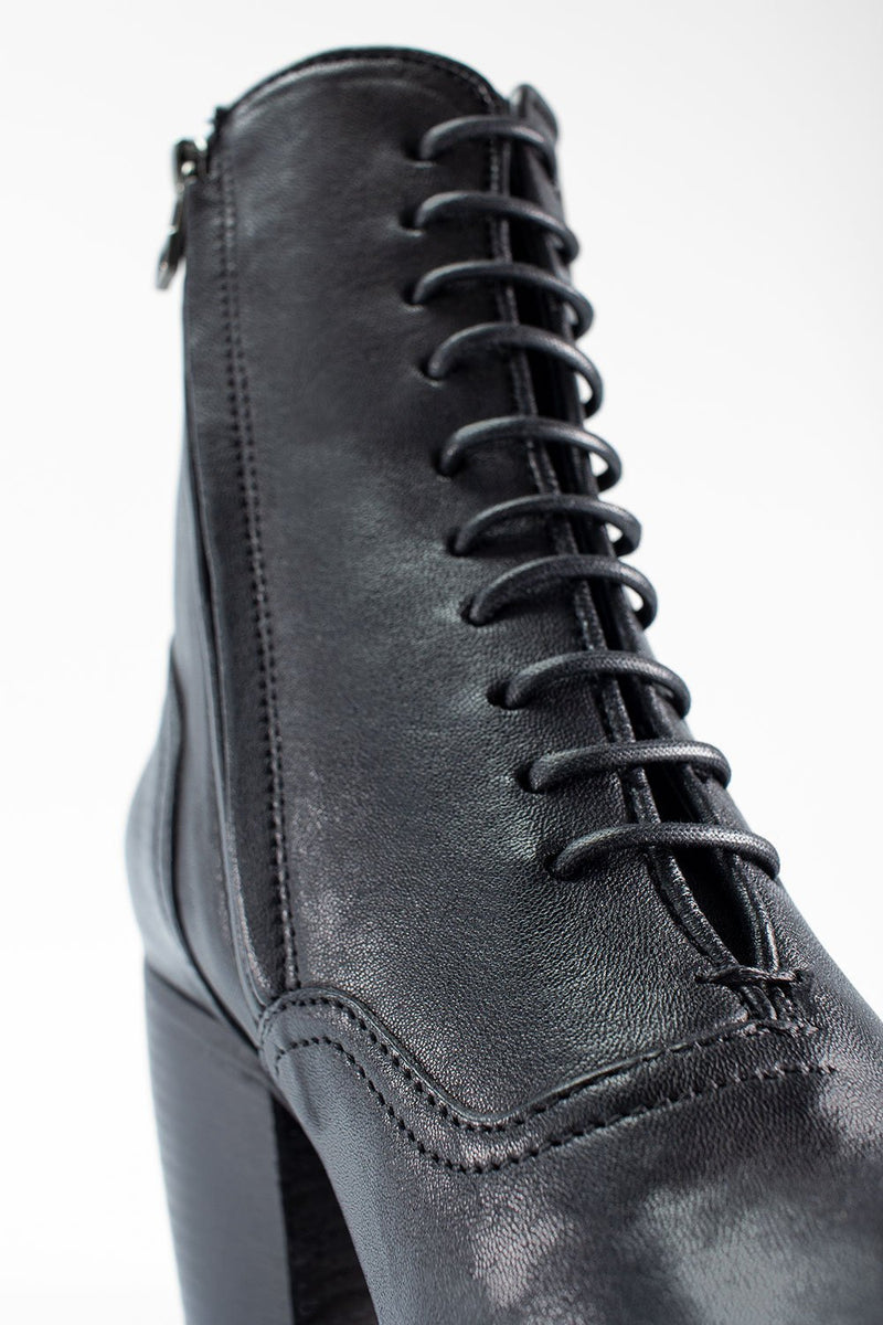 ASTON royal-black lace-up boots.