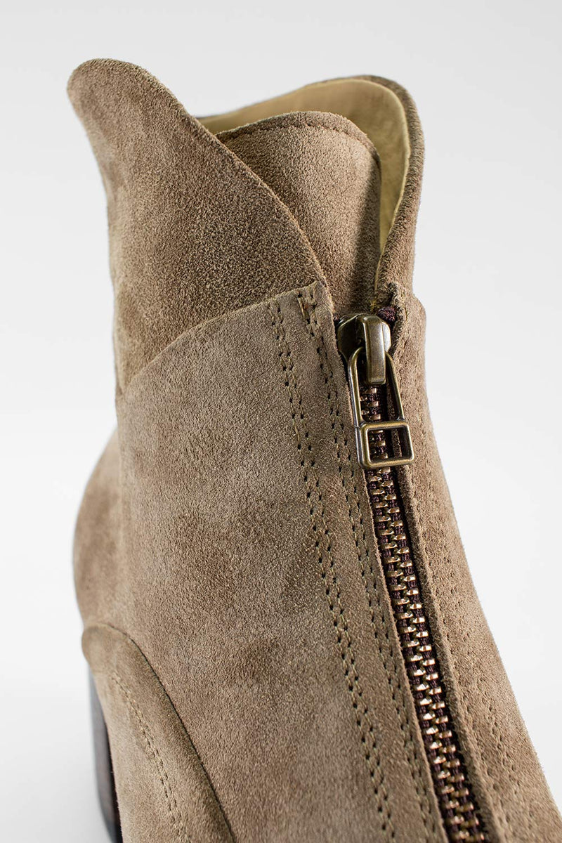 RILEY light-sand suede boots.