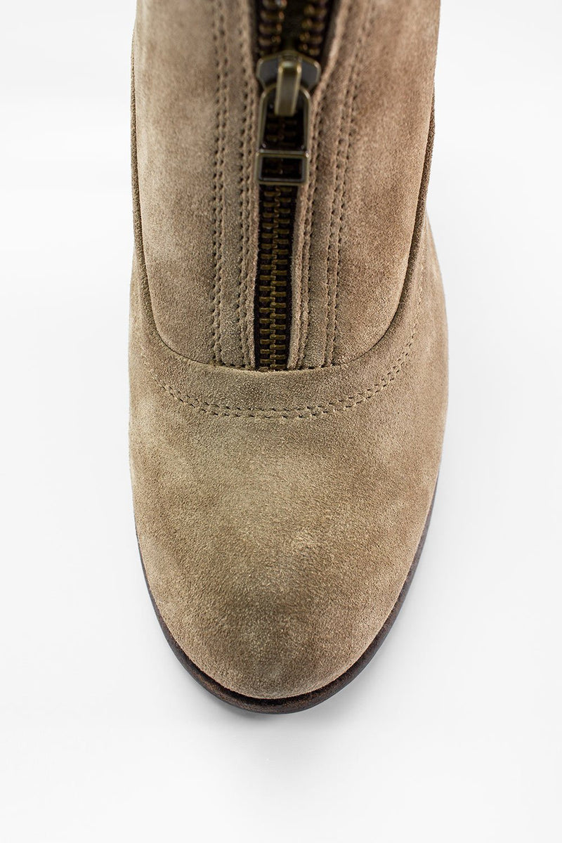 RILEY light-sand suede boots.