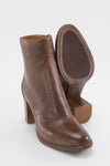 REID toasted-tan ankle boots.