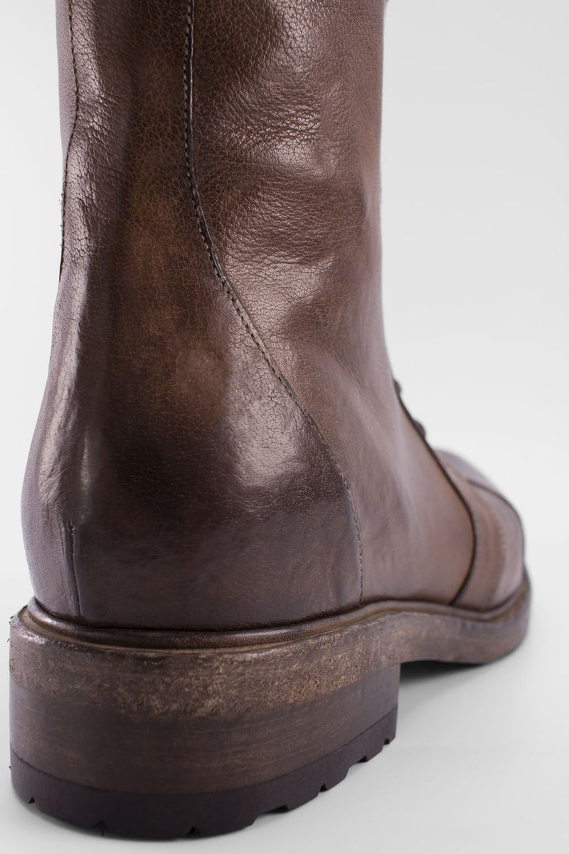 AVERY powder-chocolate lace-up boots.