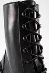 REGENT royal-black lace-up boots.