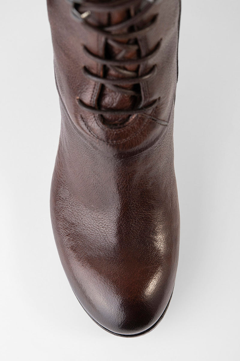 MADISON chocolate-brown high commando boots.