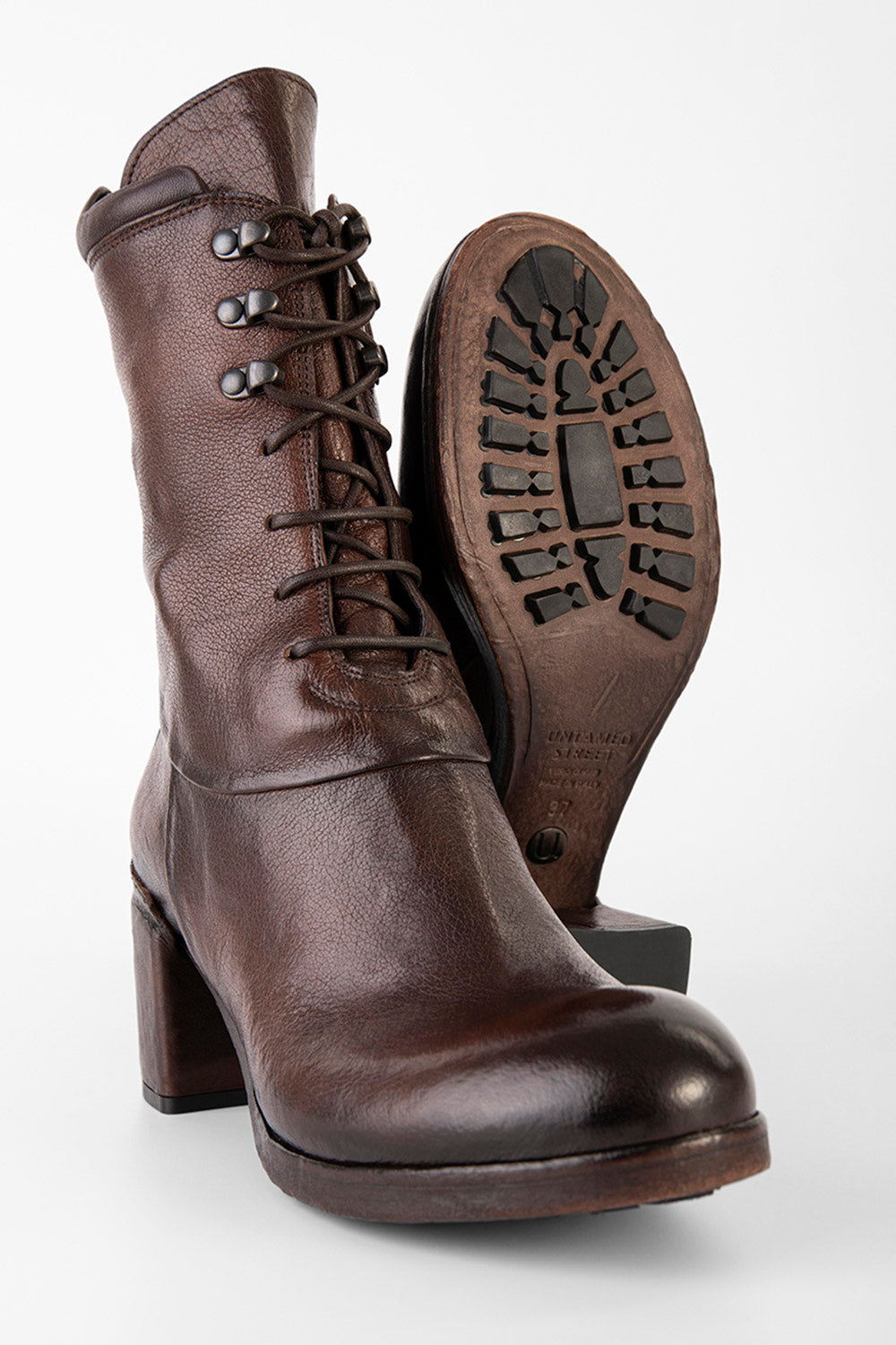 MADISON chocolate-brown high commando boots.