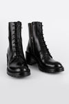 REGENT tar-black lace-up boots.