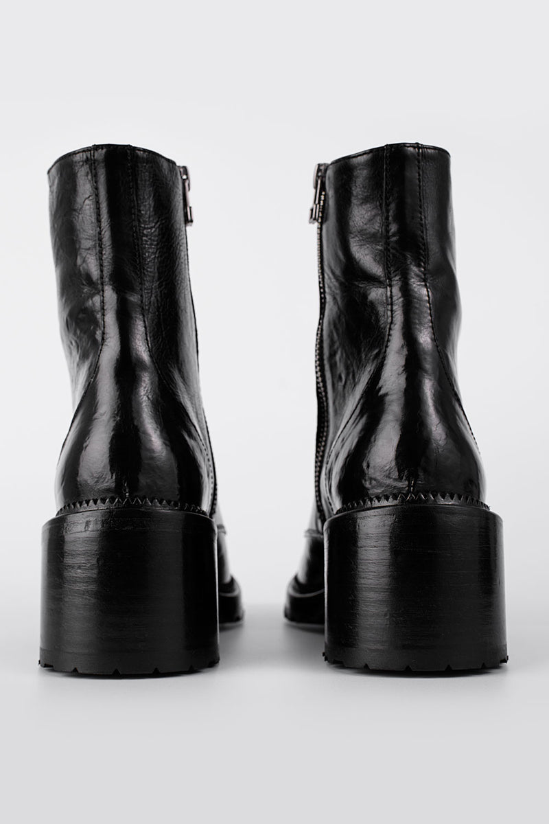 REGENT tar-black lace-up boots.