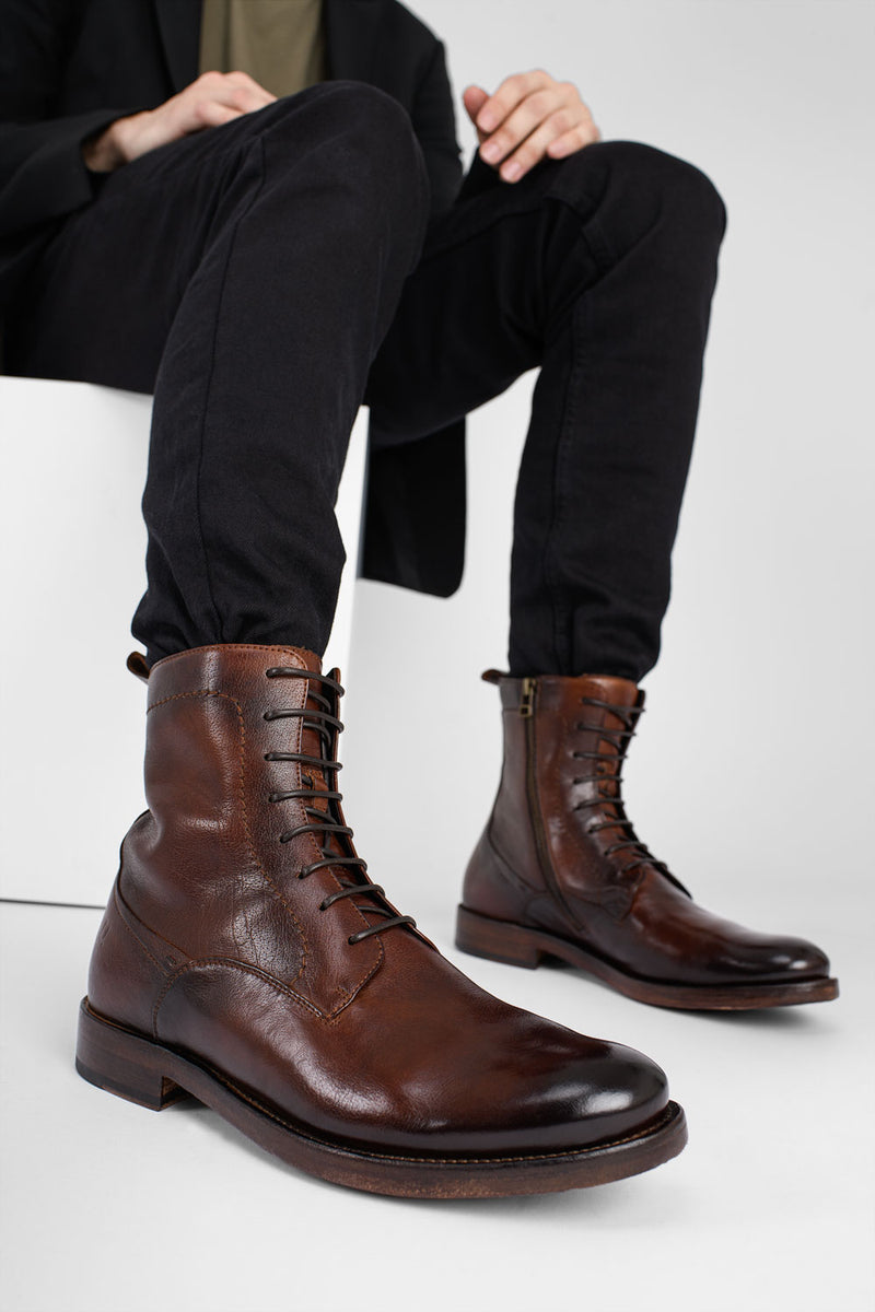 SLOANE timber-brown commando boots.