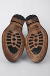 SLOANE timber-brown commando boots.