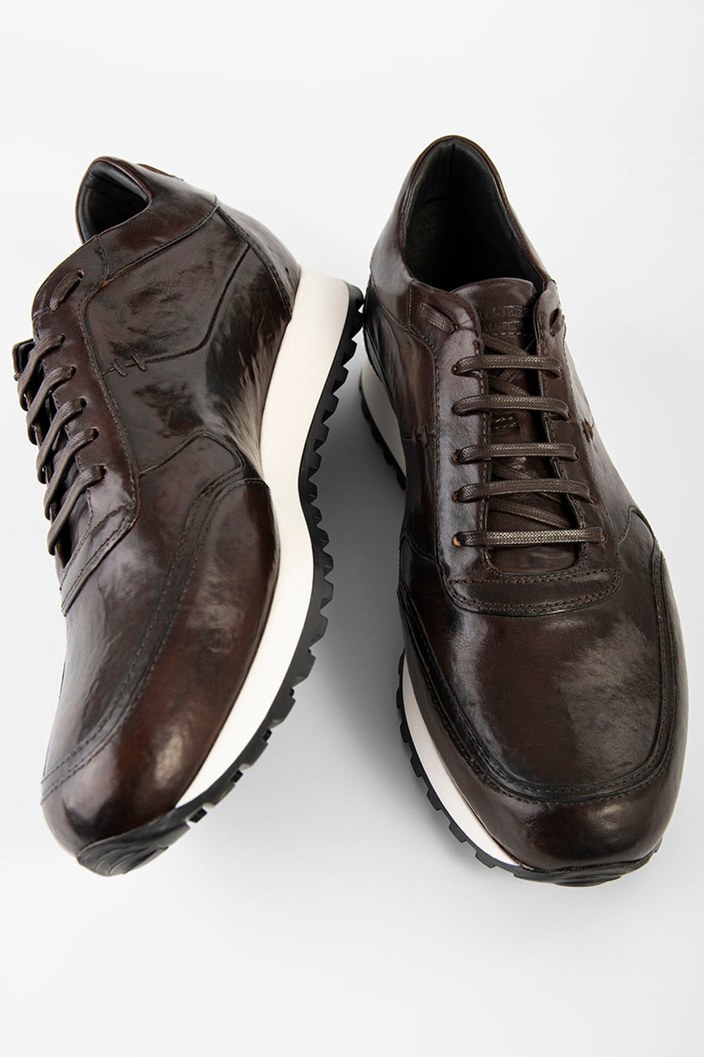 SOHO ROGUE dark-cocoa distressed runners.