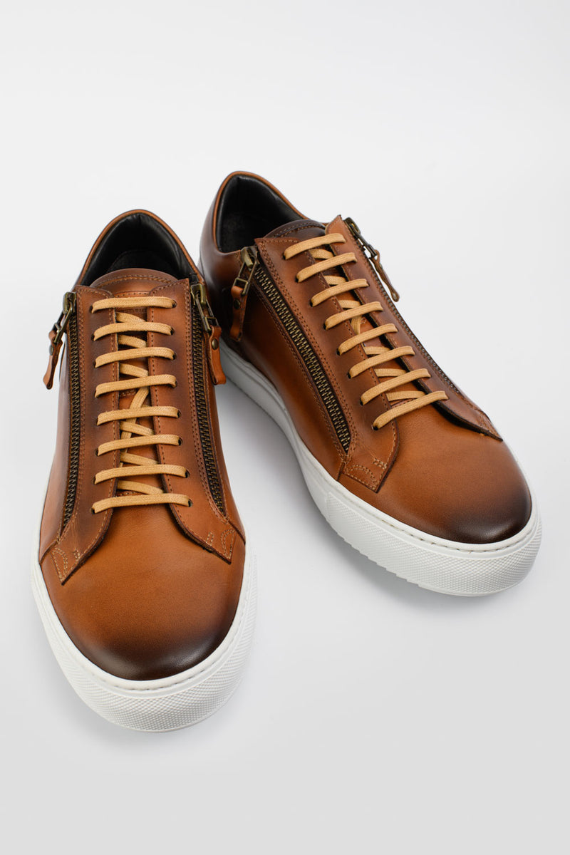 SOHO light-tan double-zip patina sneakers.