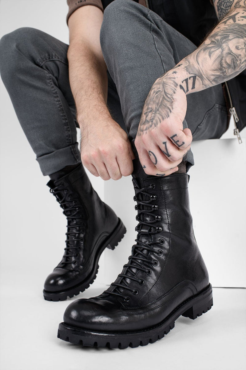 CAMDEN tar-black military boots.