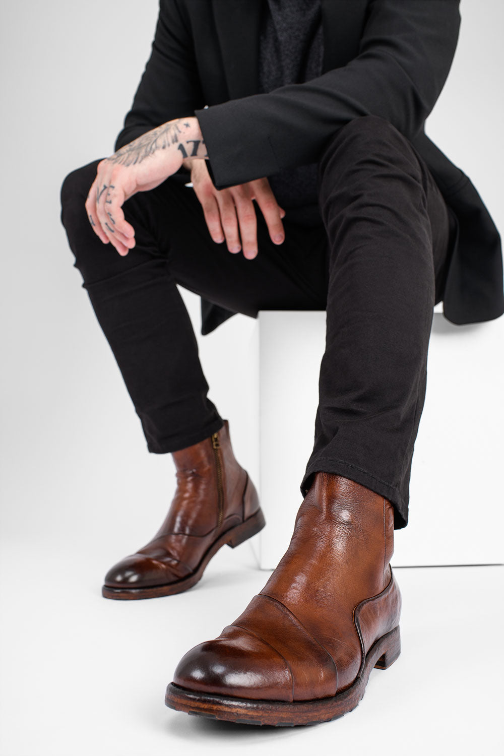 ASTON EDGE cognac laceless ankle boots.