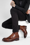 ASTON EDGE cognac laceless ankle boots.