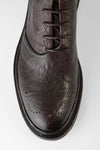 YORK cigar-brown grained welted chukka boots.