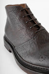 YORK cigar-brown grained welted chukka boots.