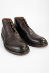 YORK cigar-brown grained welted chukka boots.