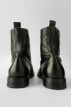 SLOANE dark-green commando boots.